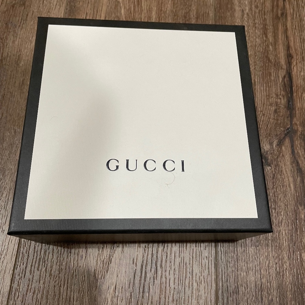 Authentic Gucci box with gift ribbon